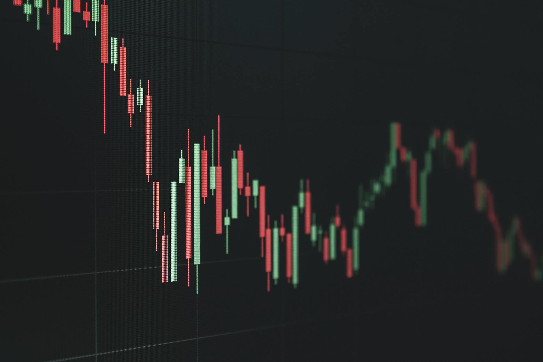 Stock market data chart showing trends in red and green. Perfect for financial and business themes.