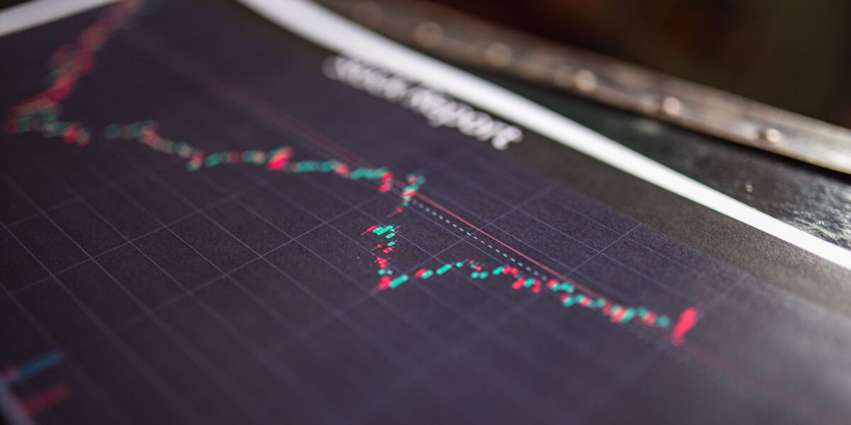 Close-up of a stock report showing a financial data graph.