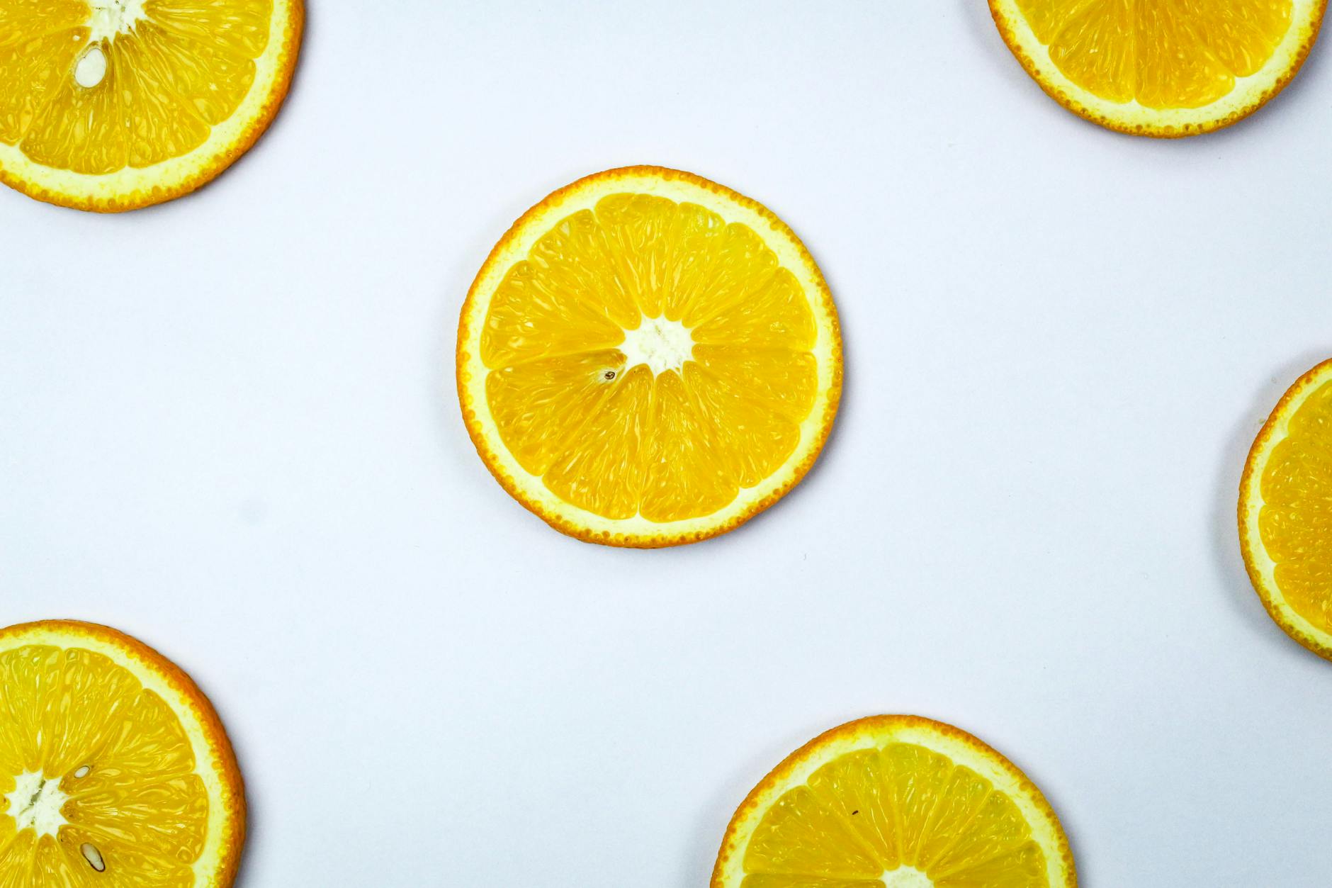 Top view of fresh citrus slices showcasing vibrant orange colors.