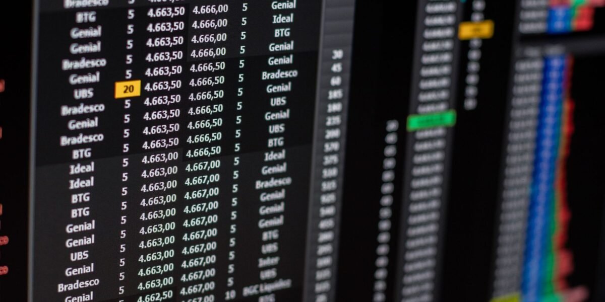Close-up of financial data on a computer screen showing stock market trends.