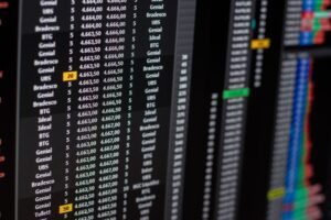Close-up of financial data on a computer screen showing stock market trends.