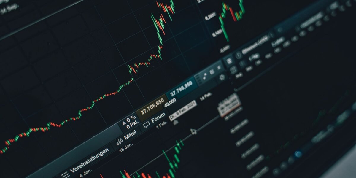 Close-up of stock market trading screen displaying financial growth and charts.