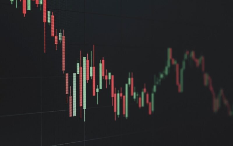 Stock market data chart showing trends in red and green. Perfect for financial and business themes.