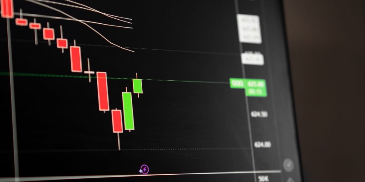 Candlestick chart showing a downward trend in the stock market analysis.
