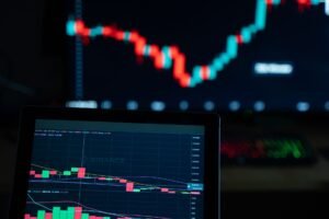 Detailed view of cryptocurrency trading charts on digital screens, showcasing market fluctuations.