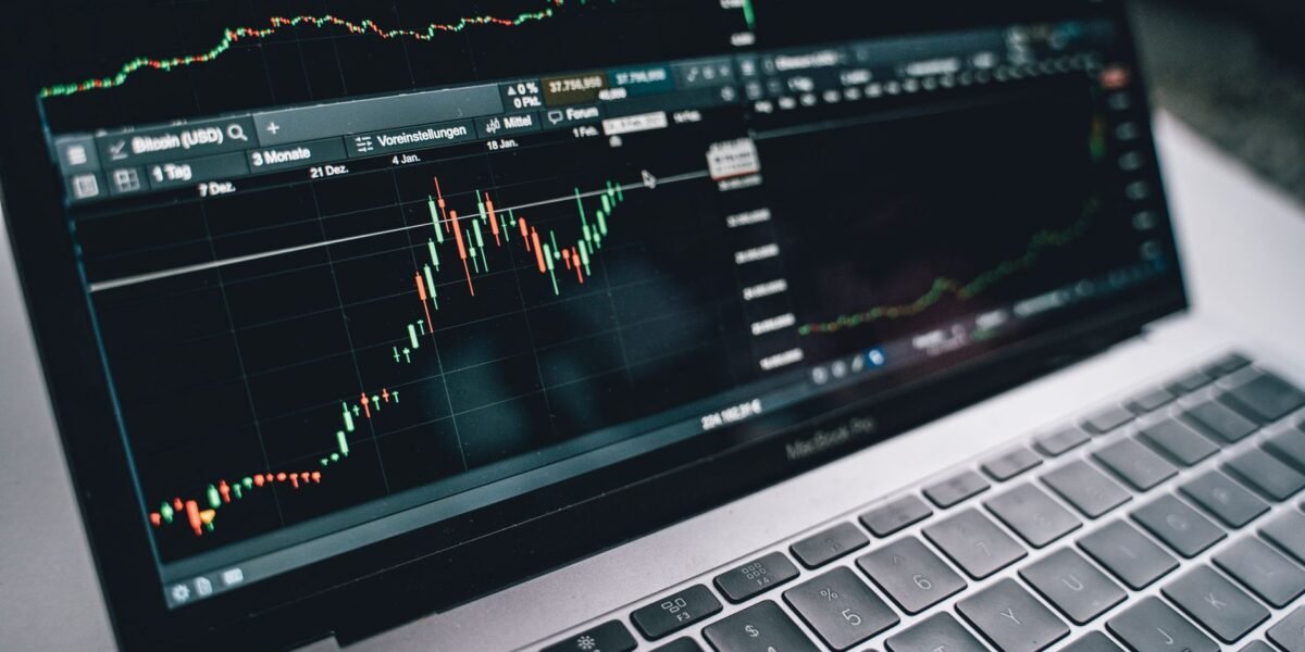 Close-up of a financial graph on a laptop screen, depicting stock market analysis in Berlin.