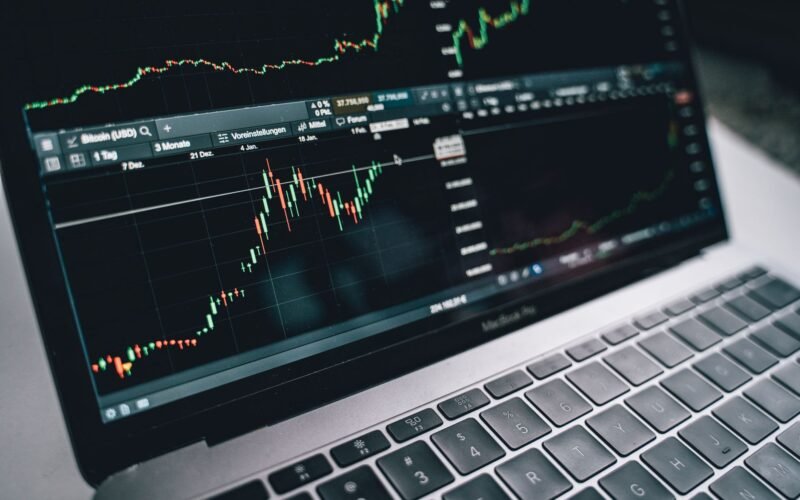 Close-up of a financial graph on a laptop screen, depicting stock market analysis in Berlin.