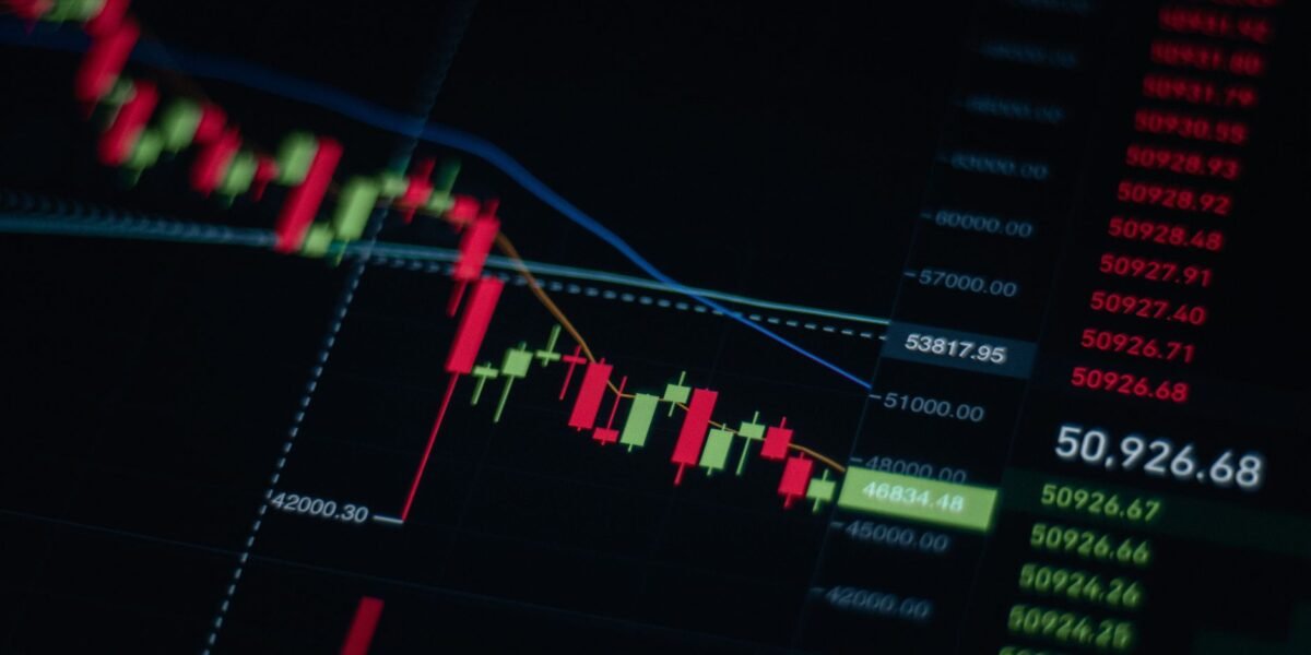 Close-up of stock market chart showing trends and data on a digital screen.