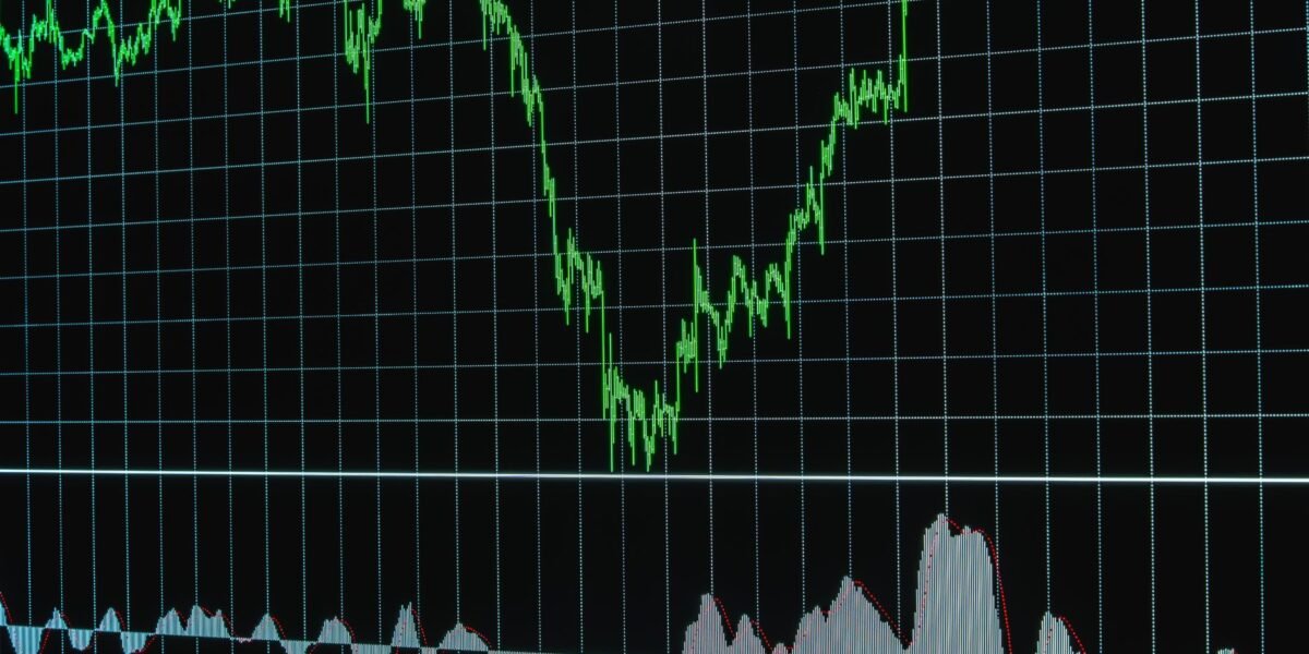 Financial chart with ascending trends on a grid background, ideal for business or stock market themes.